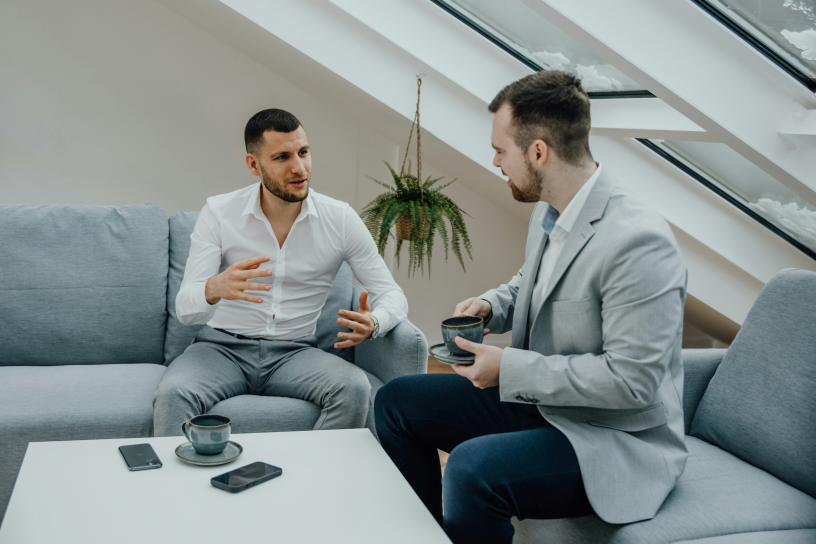 Salespeople talking to each other